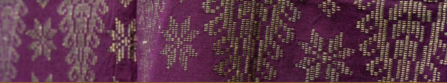 Traditional Minangkabau Purple Songket Fabric Texture